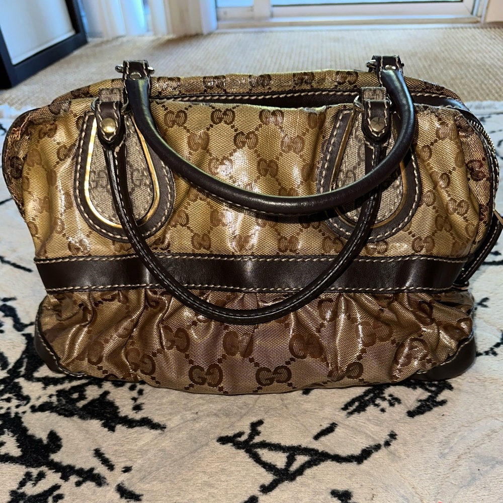 Authentic Gucci multi color crystal handbag.EUC sold as is.